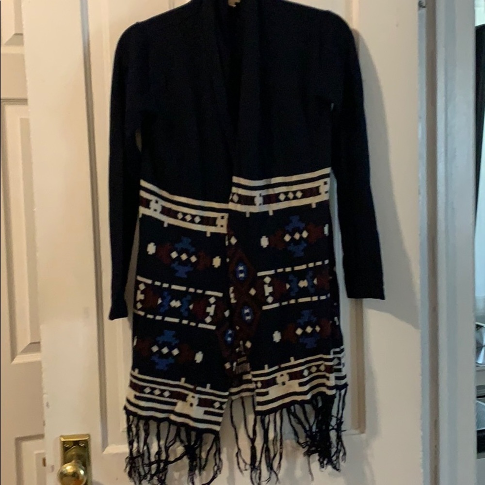 Long sweater with fringe